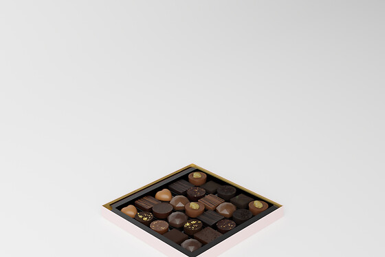 Un écrin de chocolats ganaches et pralinés avec boisson pétillante - FAUCHON Paris